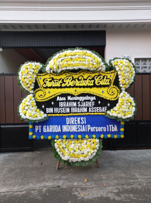 Papan Bunga Duka di Pantai Burung