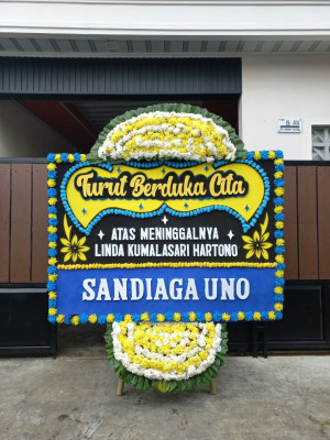 Papan Bunga Duka di Pantai Burung